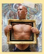 Image of a man holding a picture frame